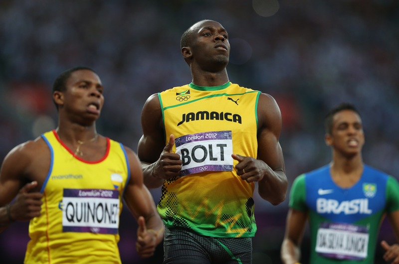 Illustration for article titled Photos Of Usain Bolt Looking Bored As He Blows Past The Best Runners In The World